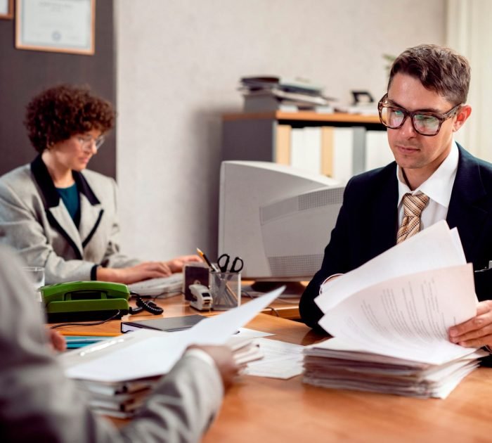 vintage-style-people-working-office-with-computers
