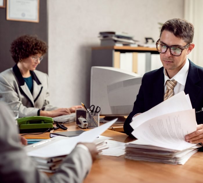 vintage-style-people-working-office-with-computers